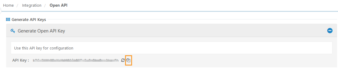 Copy Generated Open API Key QMetry Open API integration screen showing the Generate API Keys section. A generated API Key is displayed in a masked format with a copy icon highlighted in orange for easy duplication. The key can be used for SCIM or other integration configurations.